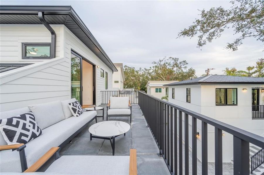 Exterior details and patio area of a home in , Sarasota (Image 26).