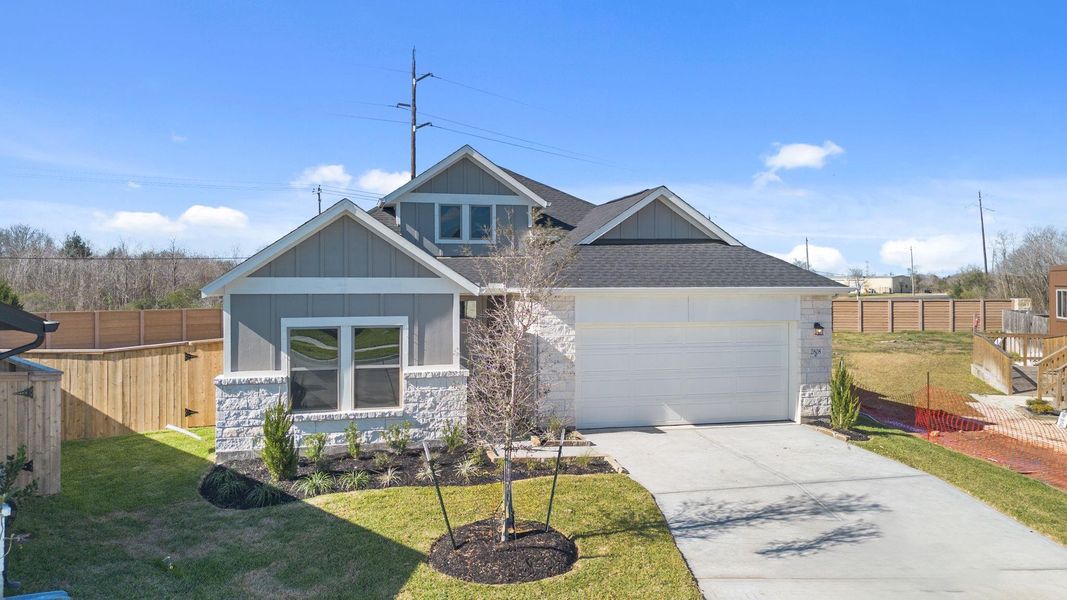 Front exterior of a new home in , Alvin, TX, highlighting curb appeal (Image 20).