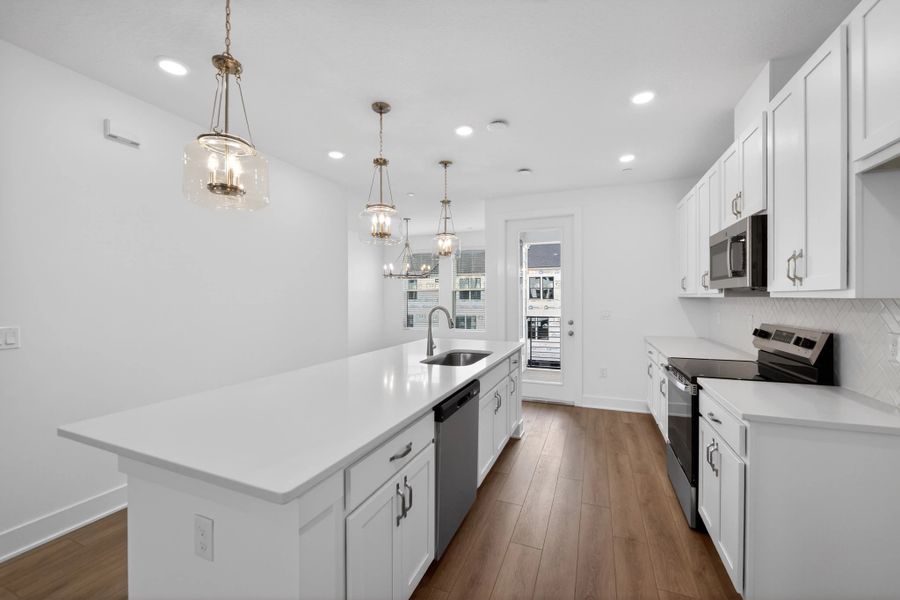 Furnished interior view inside a new home in Parkview at Hamlin, Winter Garden (Image 9).