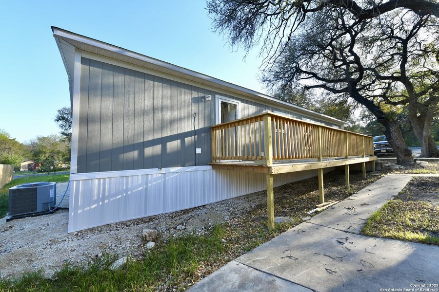 Front exterior of a new home in , San Antonio, TX, highlighting curb appeal (Image 16).