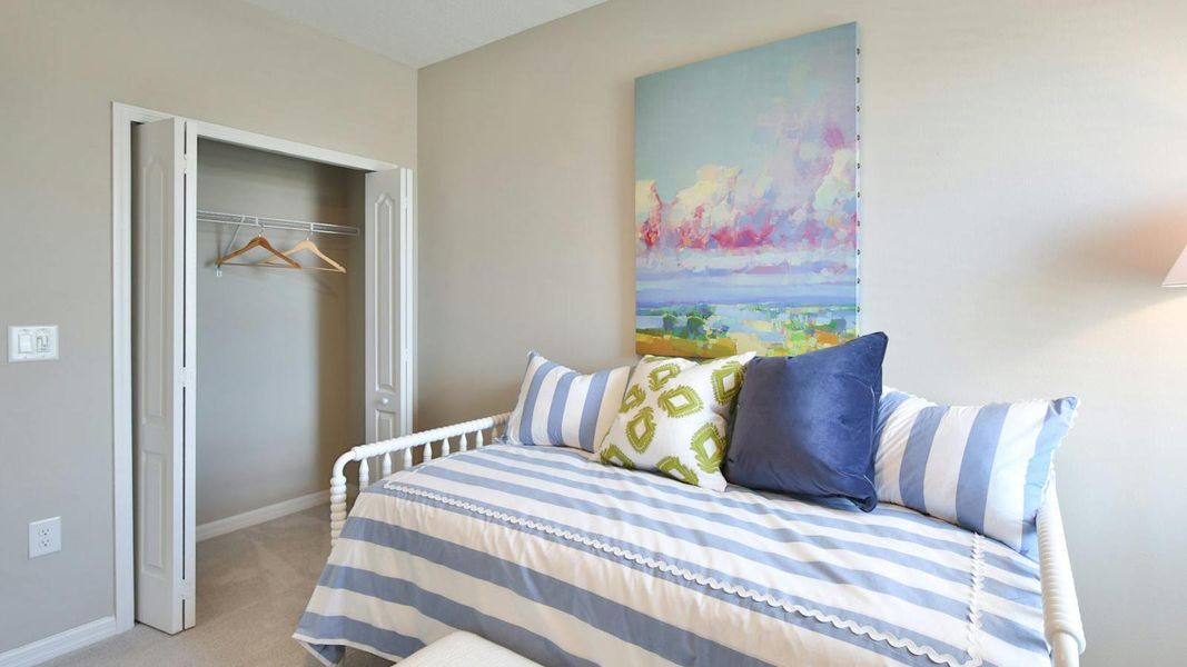 Furnished interior view inside a new home in Palm Grove Real Estate and Homes for Sale in Lakewood Ranch, FL - Neal Communities, Lakewood Ranch (Image 27).