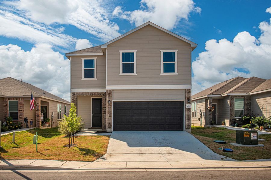 Front exterior of a new home in , New Braunfels, TX, highlighting curb appeal (Image 17).