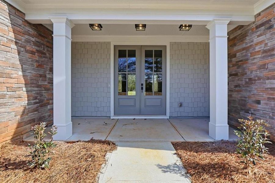 Exterior details and patio area of a home in , Statham (Image 34).