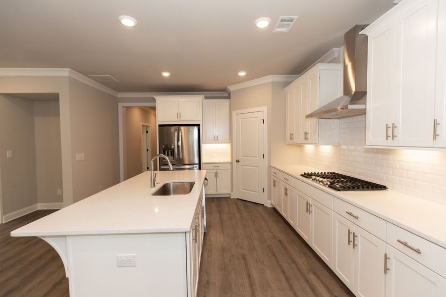 Representative furnished interior of a home built from the The Charleston by The Providence Group in Aberdeen, Hoschton (Image 6).