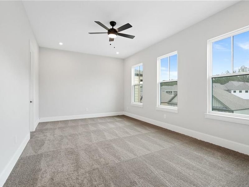 Spacious, unfurnished interior of a new home in The Village at Towne Lake, Woodstock (Image 71).