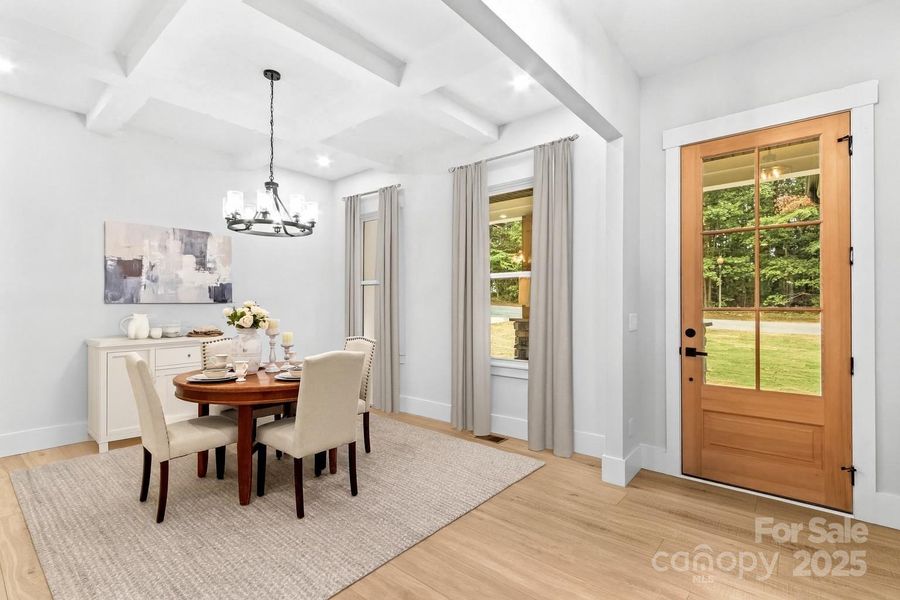 Bonus Room could be formal Dining or Office. Notie the beautiful coffered ceiling. Upgrades galore in this home.