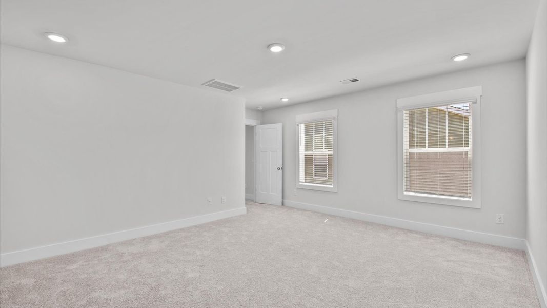 Representative furnished interior of a home built from the Jasmine by DRB Homes in Harrier Point, Woodruff (Image 24).
