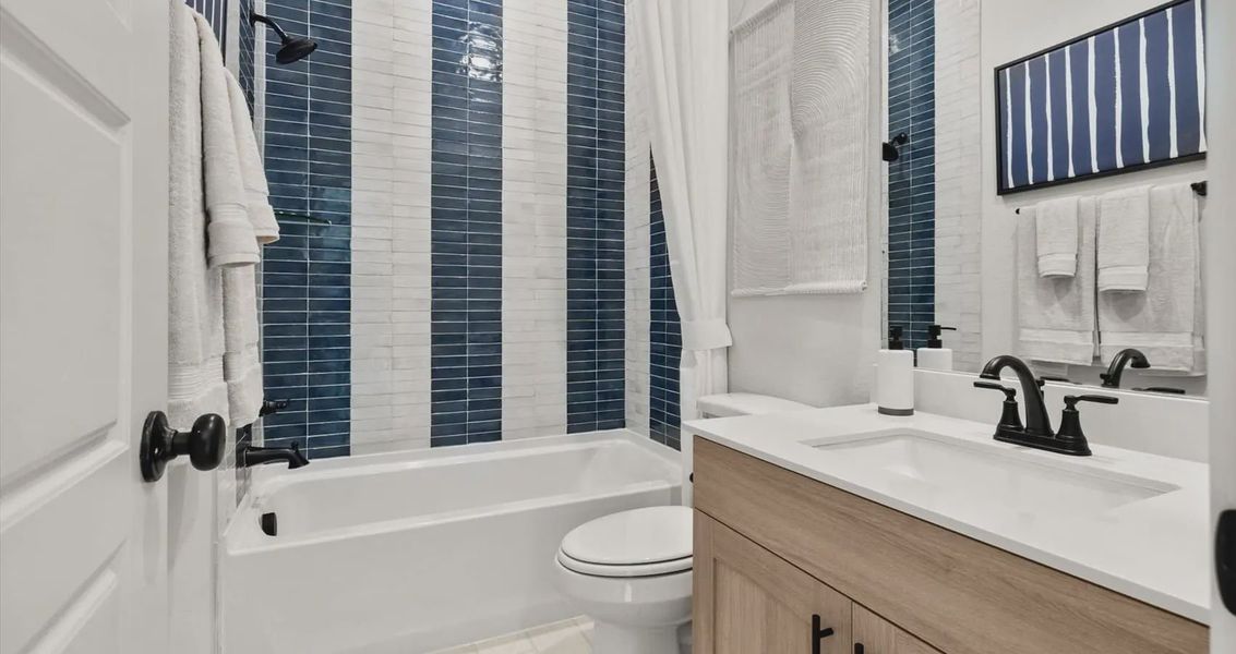 Furnished interior view inside a new home in Stream Waters, Buda (Image 18).