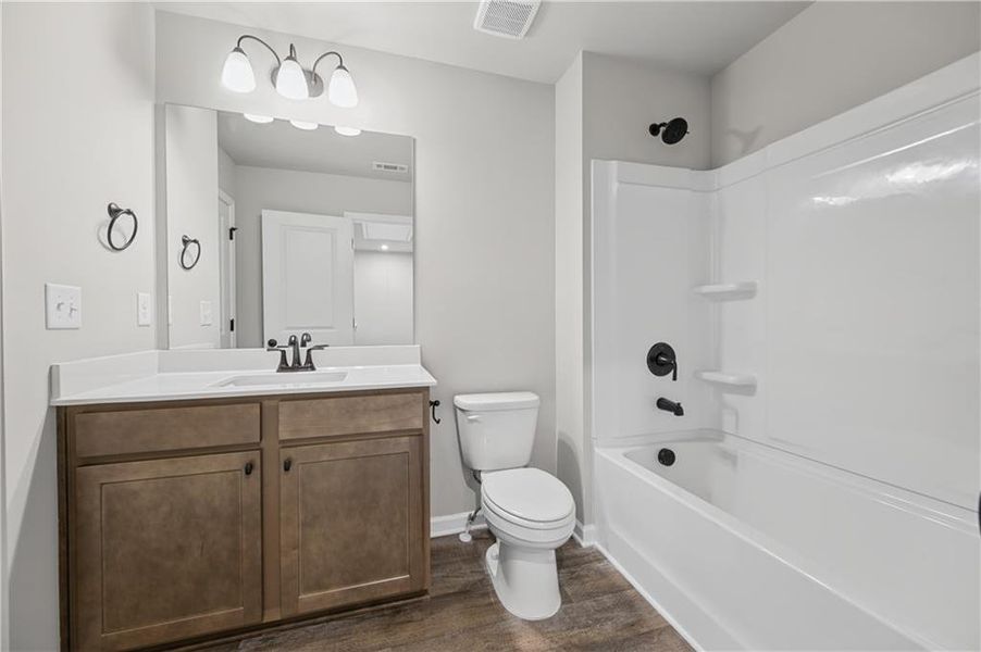 Furnished interior view inside a new home in Village Green, Adairsville (Image 6).