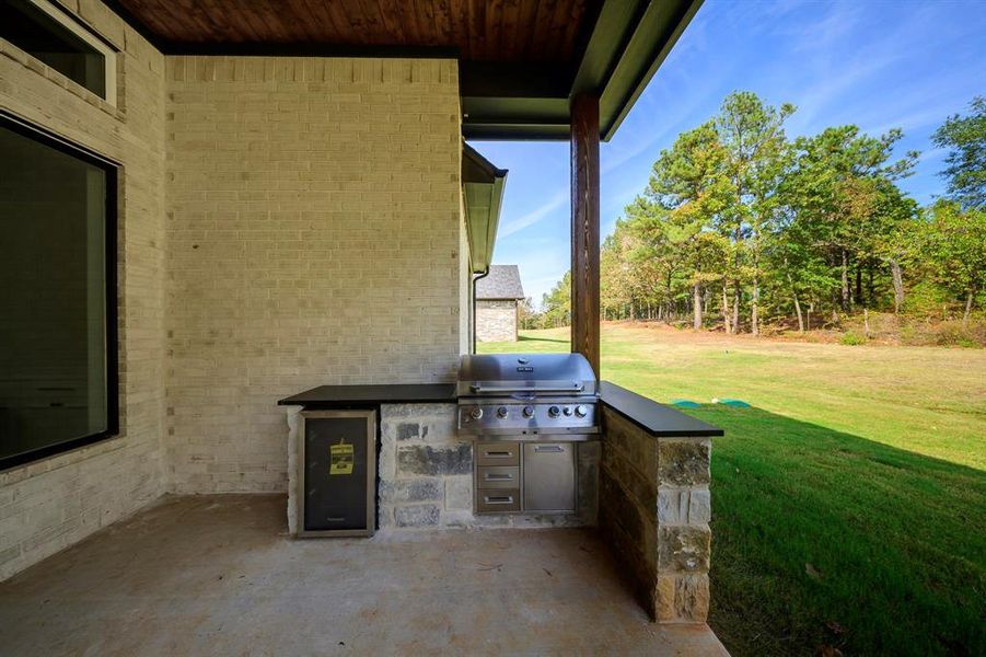 View of patio featuring area for grilling View of patio featuring area for grilling