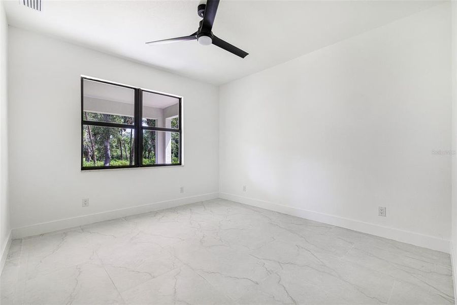 Spacious, unfurnished interior of a new home in , Port Charlotte (Image 33).