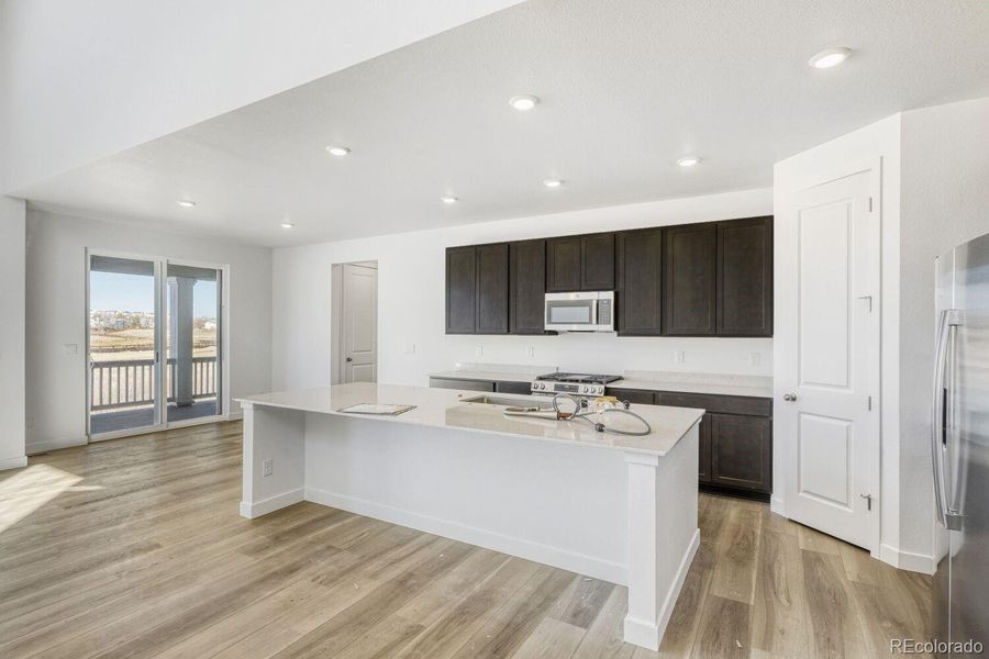 Furnished interior view inside a new home in Newlin Crossing, Parker (Image 4).