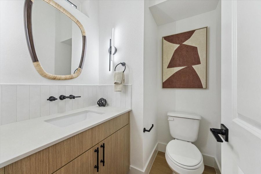 Guest bathroom with modern vanity and finishes Guest bathroom with modern vanity and finishes