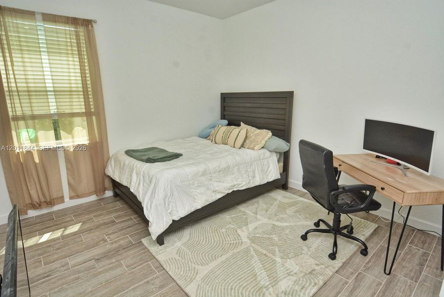 Furnished interior view inside a new home in Central Park, Port St. Lucie (Image 34).