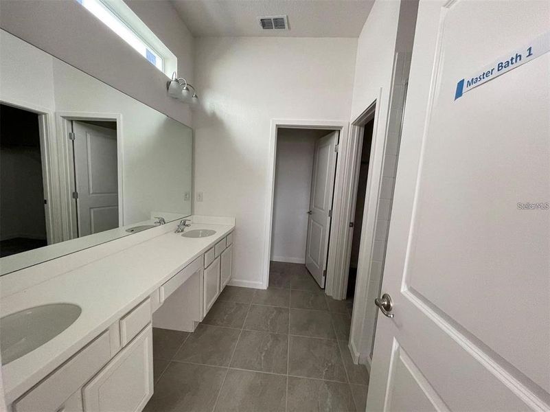 Furnished interior view inside a new home in , Kissimmee (Image 12).