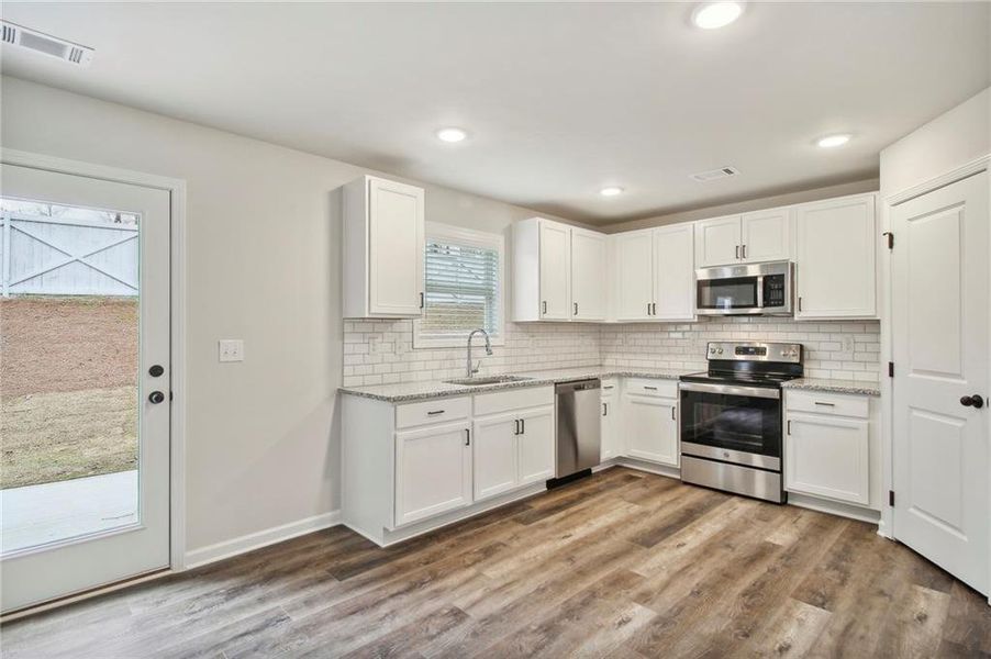 Furnished interior view inside a new home in , Auburn (Image 3).