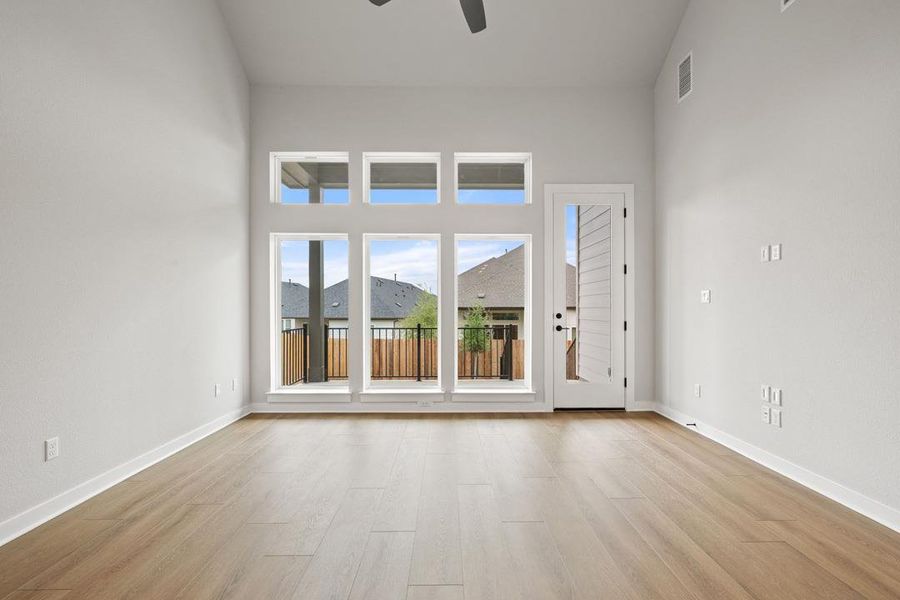 Spacious, unfurnished interior of a new home in Heritage, Dripping Springs (Image 31).