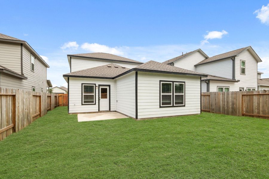 Exterior details and patio area of a home in Lonestar Collection at Granger Pines, Conroe (Image 3). Exterior details and patio area of a home in Lonestar Collection at Granger Pines, Conroe (Image 3).
