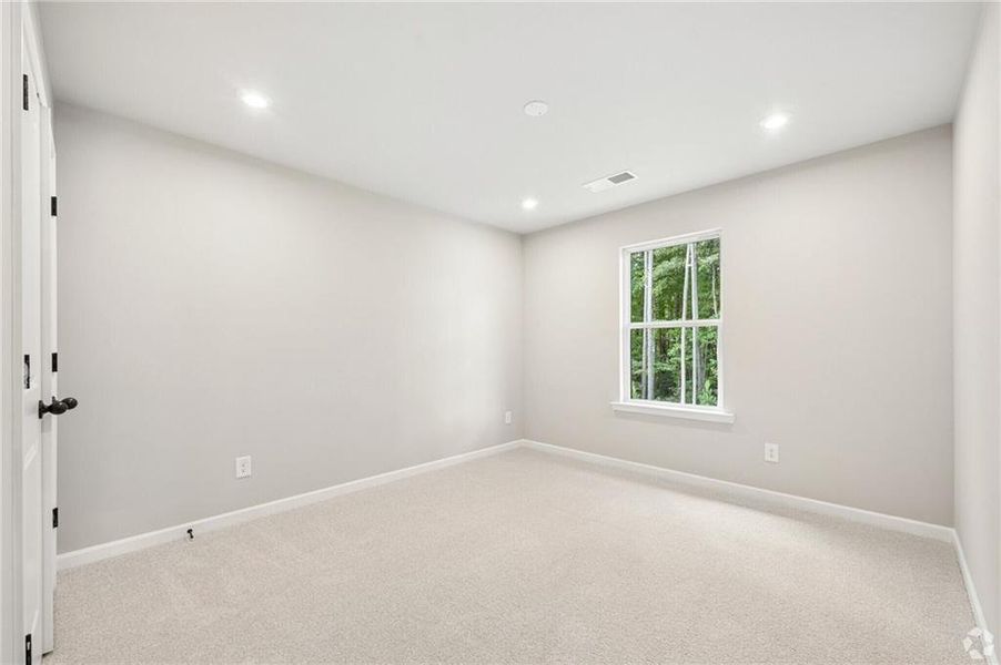 Spacious, unfurnished interior of a new home in The Overlook at Factory Shoals, Mableton (Image 18).