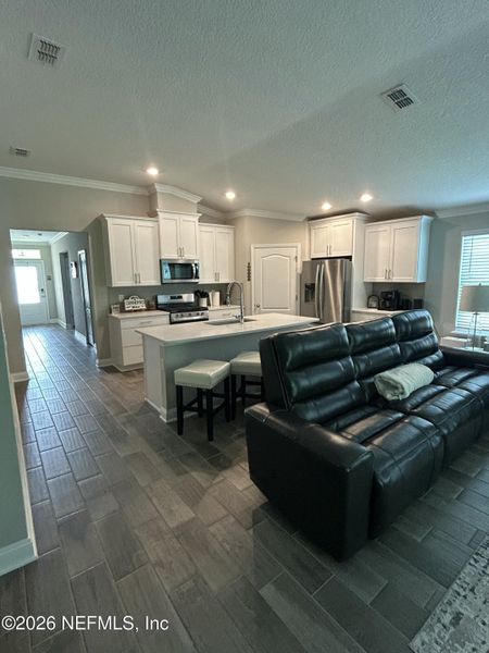 Furnished interior view inside a new home in Dorado at Entrada, St. Augustine (Image 10).