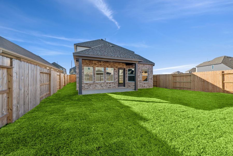 Exterior details and patio area of a home in Marvida, Cypress (Image 23).
