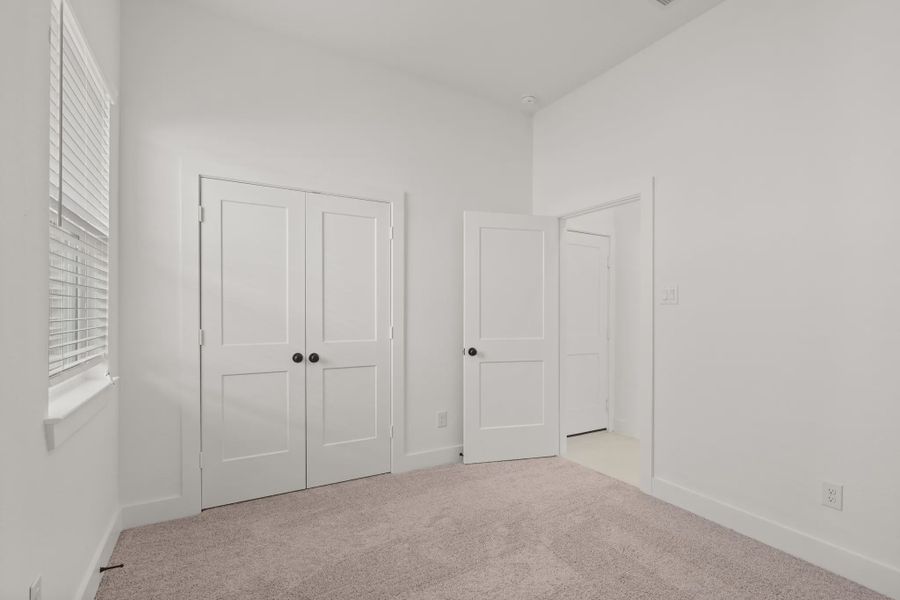 Representative unfurnished interior of a home built from the Berkley by Chesmar Homes in The Woodlands Hills, Willis (Image 17). Representative unfurnished interior of a home built from the Berkley by Chesmar Homes in The Woodlands Hills, Willis (Image 17).