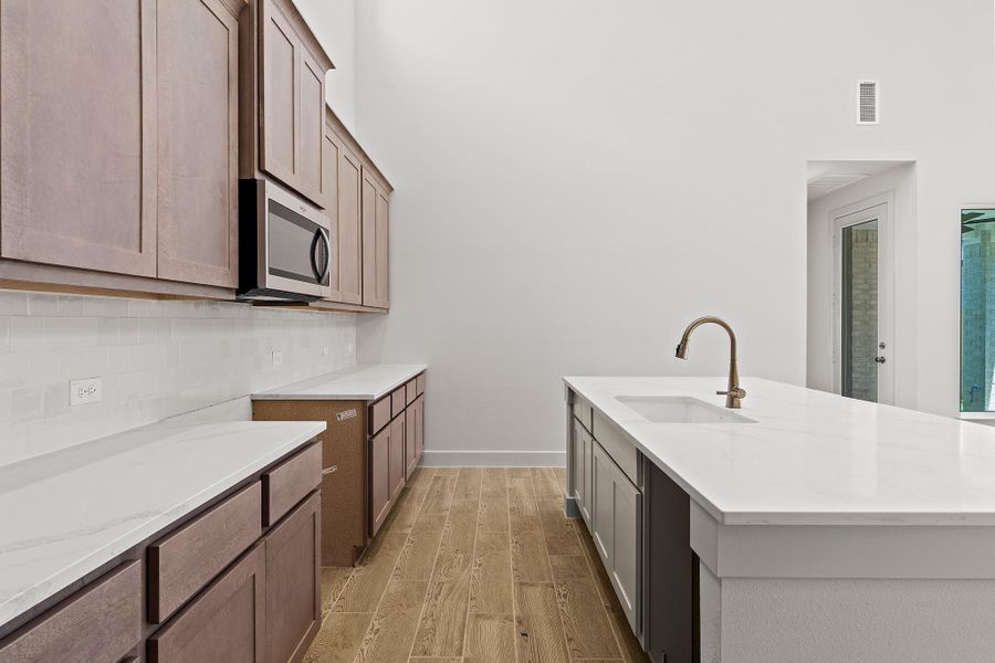 Furnished interior view inside a new home in Parmer Ranch, Georgetown (Image 7).