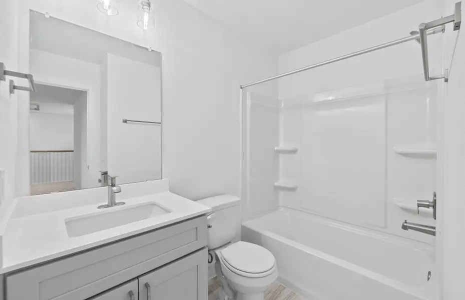 Furnished interior view inside a new home in Crosswinds, Kyle (Image 6).