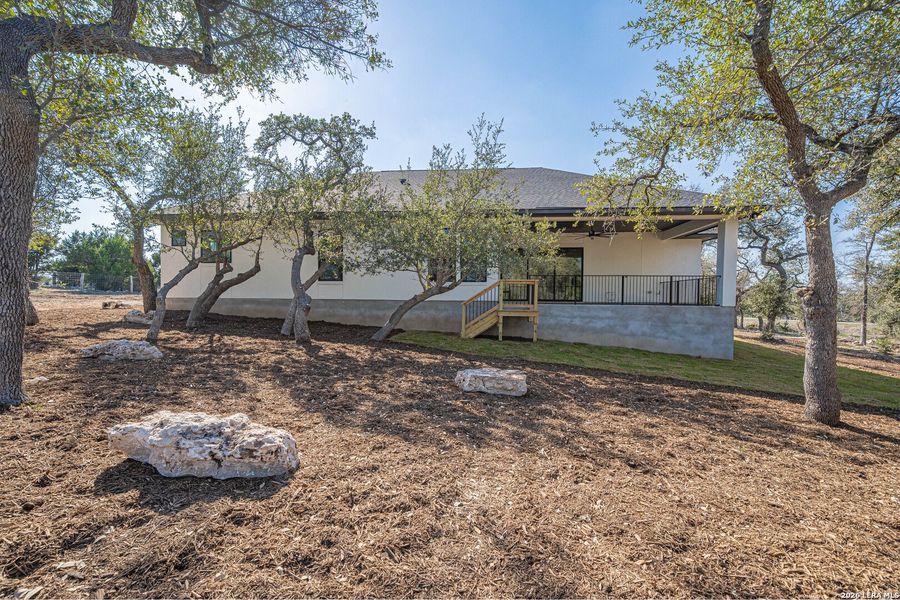 Exterior details and patio area of a home in , New Braunfels (Image 26).