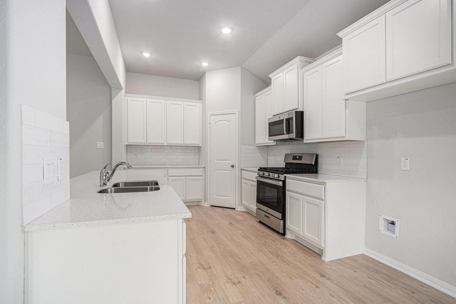 Furnished interior view inside a new home in , Bay City (Image 3). Furnished interior view inside a new home in , Bay City (Image 3).