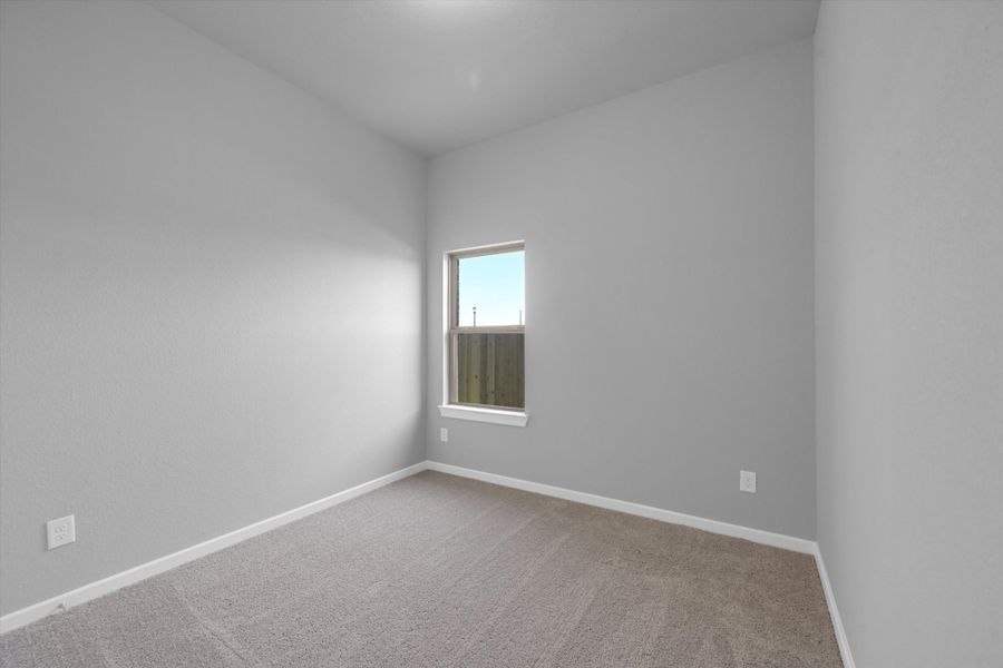 Spacious, unfurnished interior of a new home in Sunterra 40, Katy (Image 19).