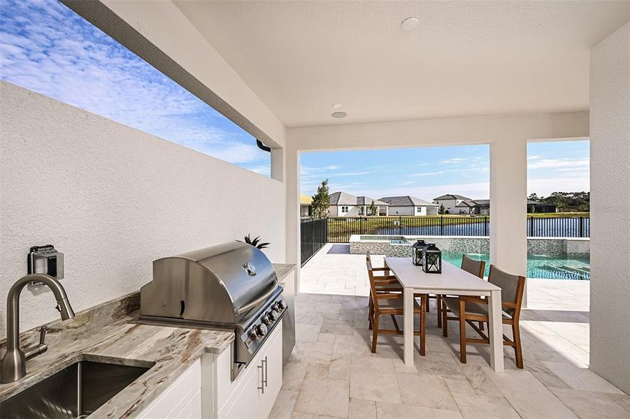 Exterior details and patio area of a home in Cassata Lakes, Nokomis (Image 3).