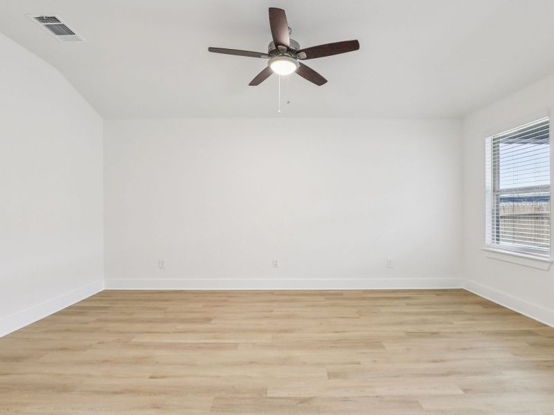 Living room in the Callaghan floorplan at a Meritage Homes community.