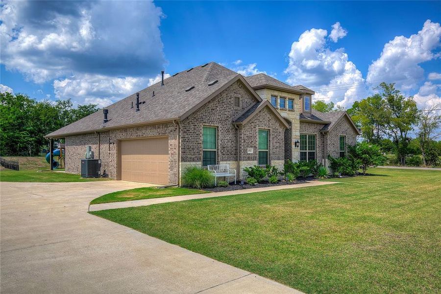 Front exterior of a new home in , Lone Oak, TX, highlighting curb appeal (Image 2). Front exterior of a new home in , Lone Oak, TX, highlighting curb appeal (Image 2).