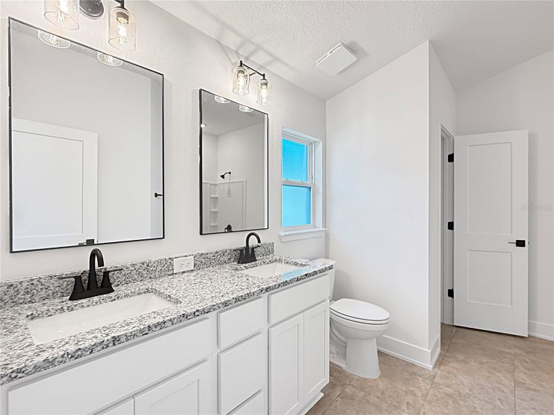Furnished interior view inside a new home in Harmony Central, St. Cloud (Image 6).