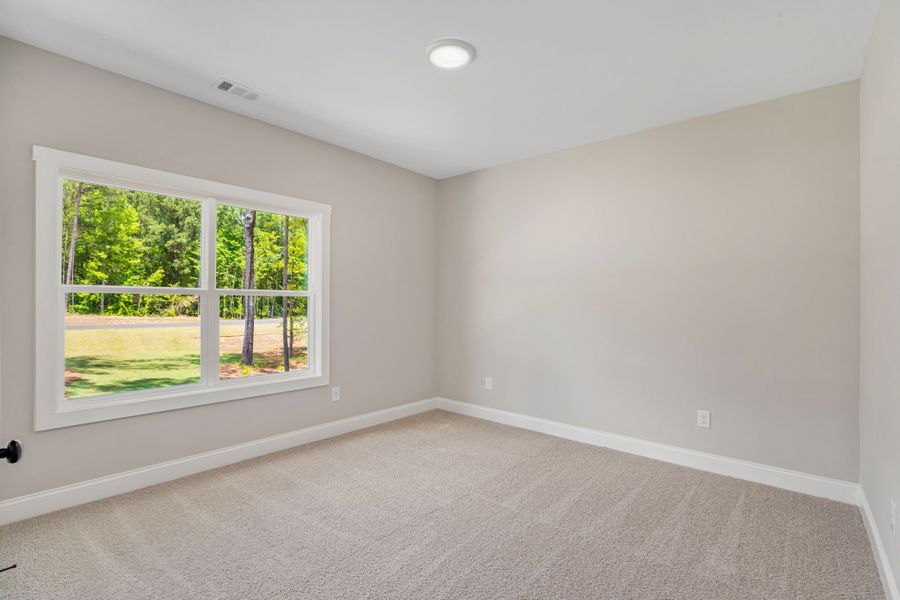 Spacious, unfurnished interior of a new home in Flint Farms, Concord (Image 13).