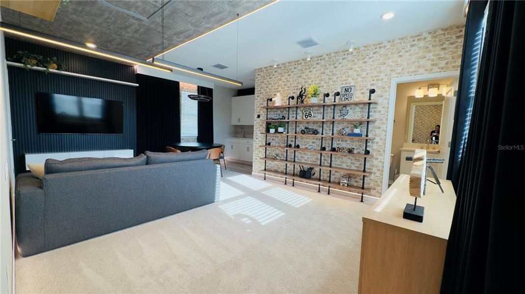 Furnished interior view inside a new home in Harvest at Ovation, Winter Garden (Image 44).