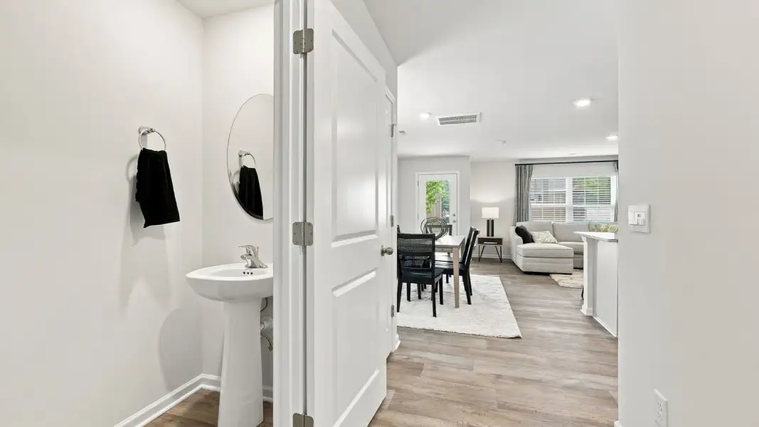 Furnished interior view inside a new home in The Townes at Hunter Hill, Rocky Mount (Image 4). Furnished interior view inside a new home in The Townes at Hunter Hill, Rocky Mount (Image 4).