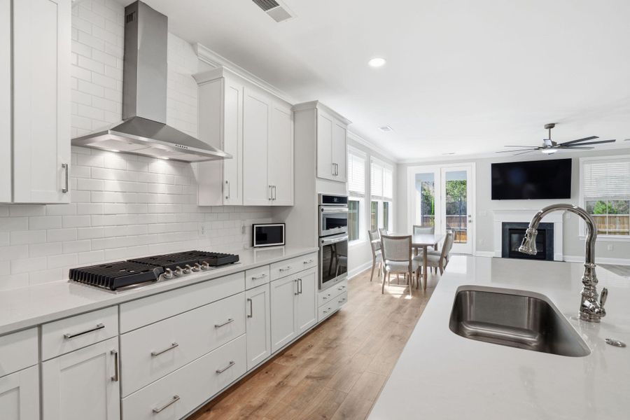 Furnished interior view inside a new home in Tidewater at Lakes of Cane Bay, Summerville (Image 31).