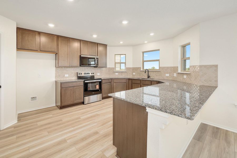 Furnished interior view inside a new home in Stoney Chase, Del Valle (Image 11).