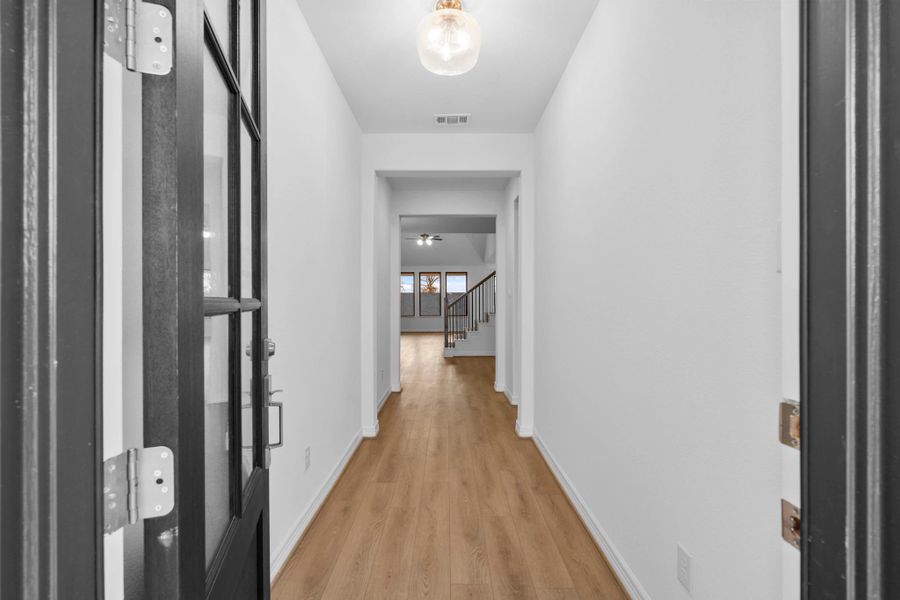 An inviting foyer sets a graceful first impression with timeless style and welcoming warmth. An inviting foyer sets a graceful first impression with timeless style and welcoming warmth.