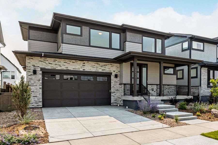 Front exterior of a new home in West Grange, Longmont, CO, highlighting curb appeal (Image 2).