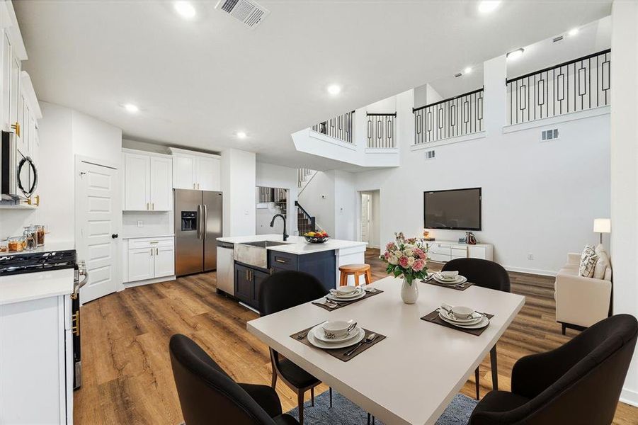 The open-concept design beautifully unites the kitchen, dining, and living areas, creating a warm and welcoming environment. With ample space for entertaining, this layout is perfect for hosting family gatherings or enjoying a cozy night in.