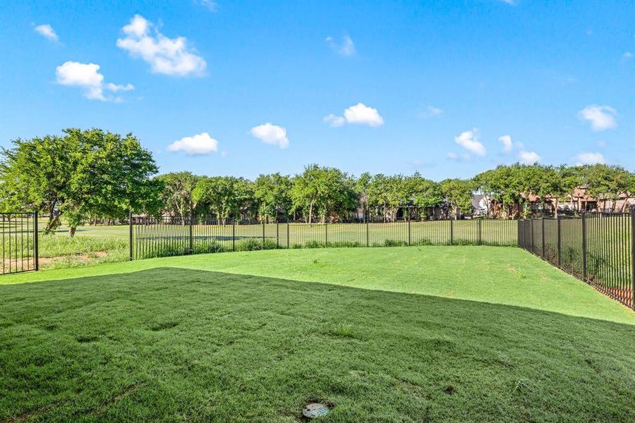 Front exterior of a new home in The Resort on Eagle Mt. Lake, Fort Worth, TX, highlighting curb appeal (Image 20). Front exterior of a new home in The Resort on Eagle Mt. Lake, Fort Worth, TX, highlighting curb appeal (Image 20).
