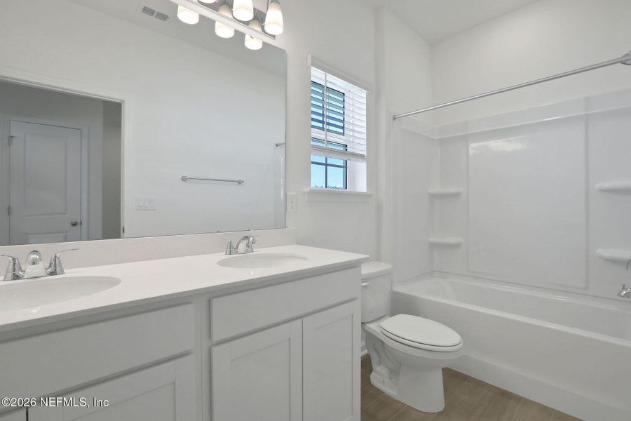 Furnished interior view inside a new home in Amberly, Green Cove Springs (Image 6).