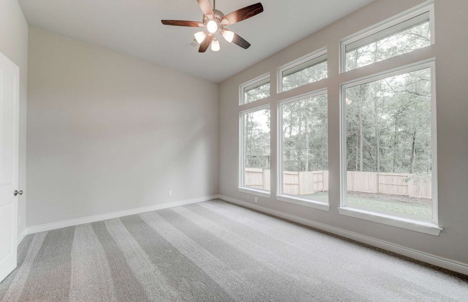 Representative unfurnished interior of a home built from the 3049 by Ravenna Homes in The Woodlands Hills 65′, Willis (Image 29). Representative unfurnished interior of a home built from the 3049 by Ravenna Homes in The Woodlands Hills 65′, Willis (Image 29).