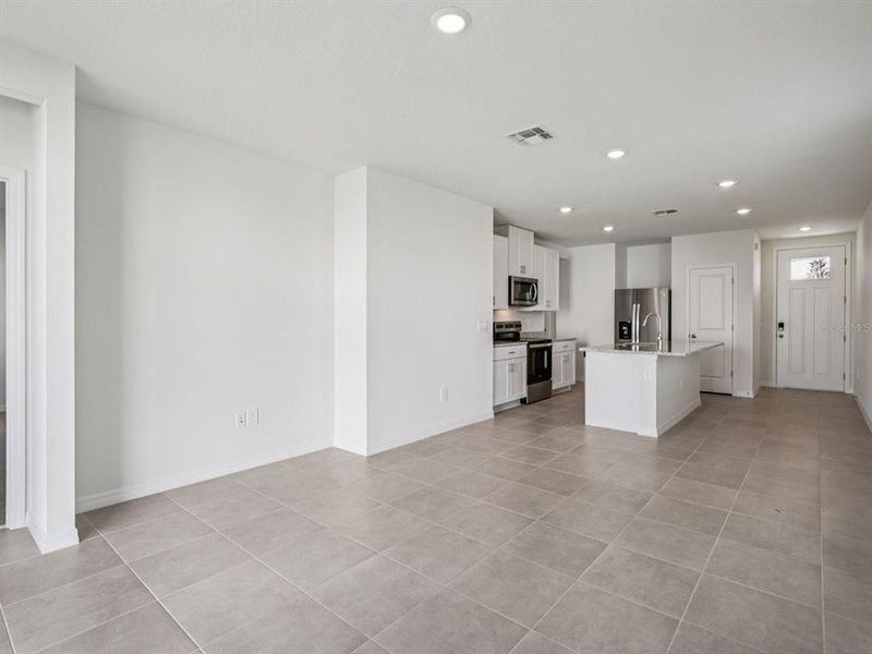 Spacious, unfurnished interior of a new home in Magnolia Bay - Premier Series, Nokomis (Image 10).