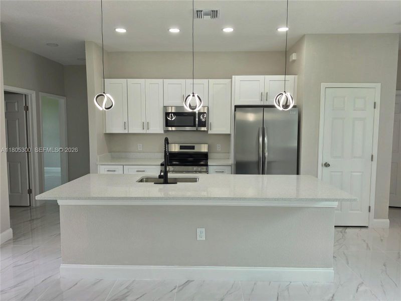 Furnished interior view inside a new home in , Lehigh Acres (Image 8).