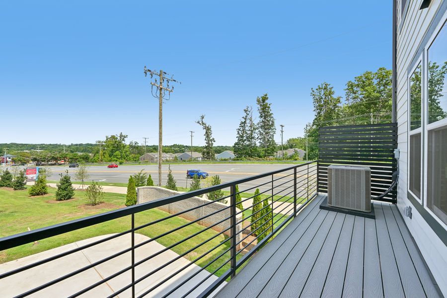Exterior details and patio area of a home in Senata at Research Park, Charlotte (Image 3). Exterior details and patio area of a home in Senata at Research Park, Charlotte (Image 3).
