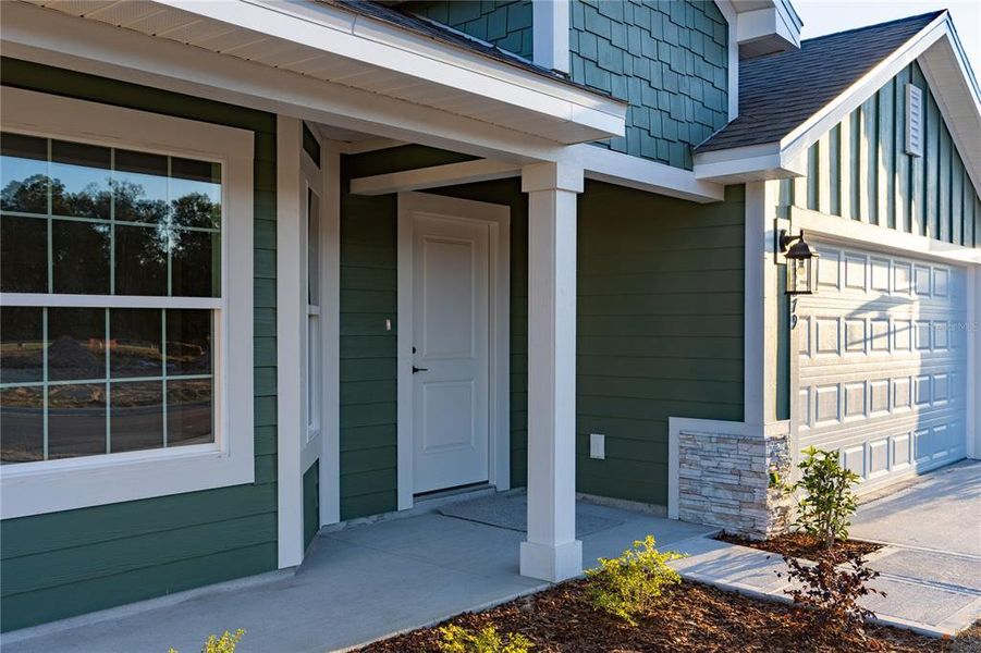 Exterior details and patio area of a home in Briarwood, Alachua (Image 21).